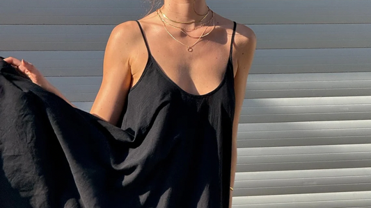 model wearing flowing elegant black ss26 cheeky chic dress